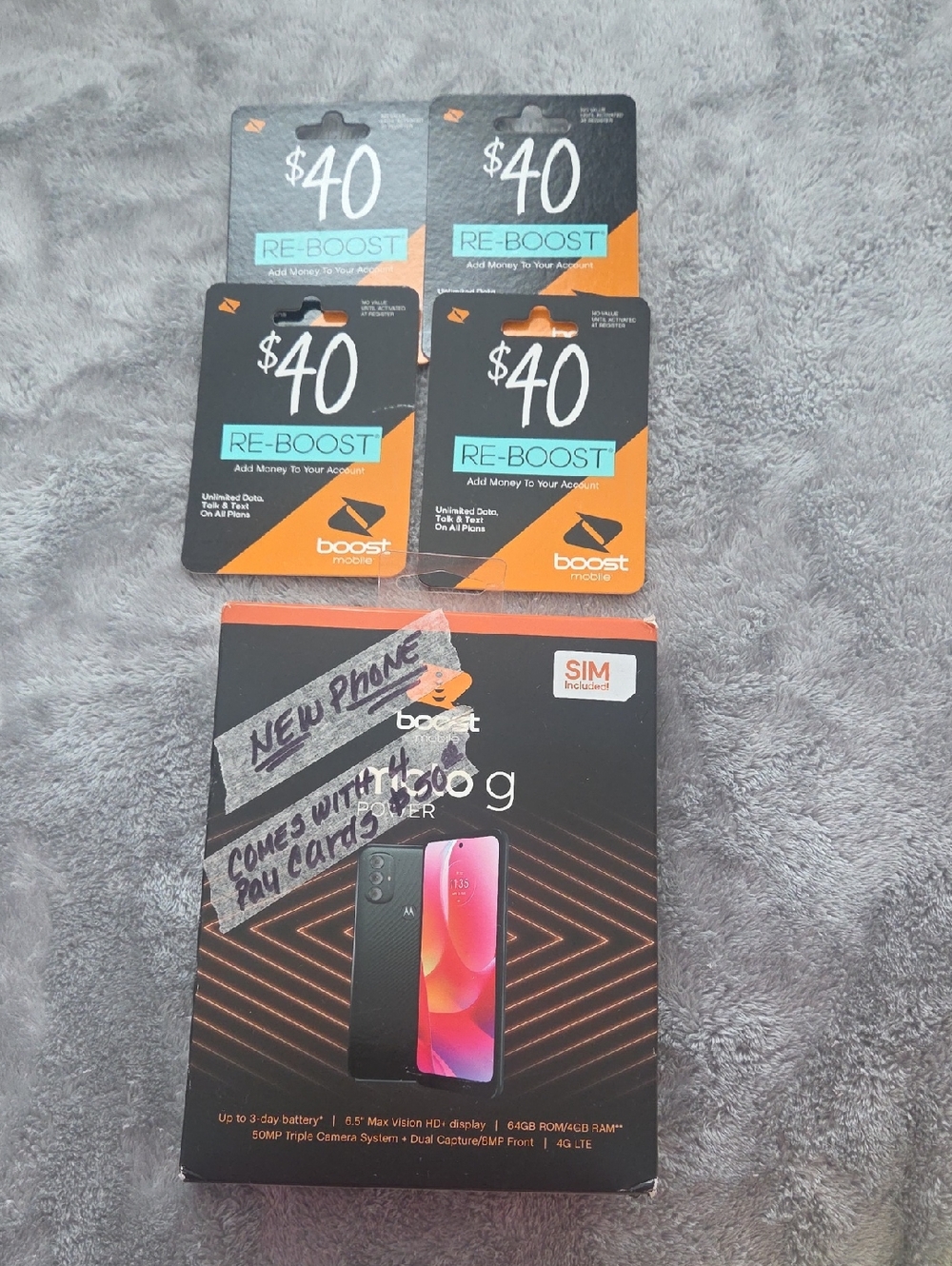 Motorola Smartphone with Orange & Black Packaging